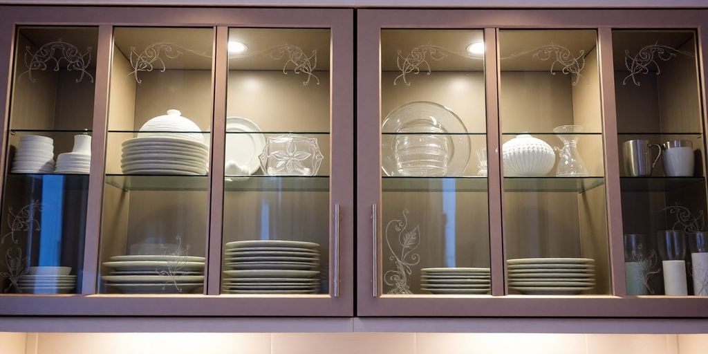 Elegant glass cabinet doors in a modern kitchen.