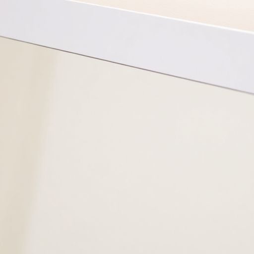 Close-up of a medicine cabinet mirror door replacement.