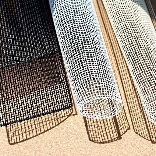 Different types of screen mesh laid out on wood.