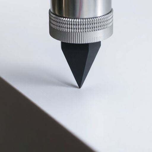 Close-up of a flat spline tool in use.